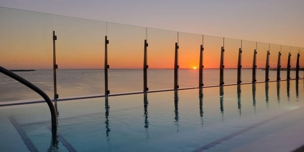 Horizon sunset view from Level Blue rooftop at Sunseeker Resort