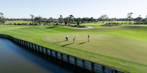 Golfers on the green at Aileron Golf course