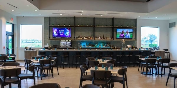 Seating area and bar at Aileron Aviators Club Restaurant & Bar