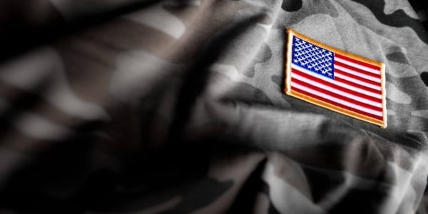 Close up of Military uniform with American flag badge