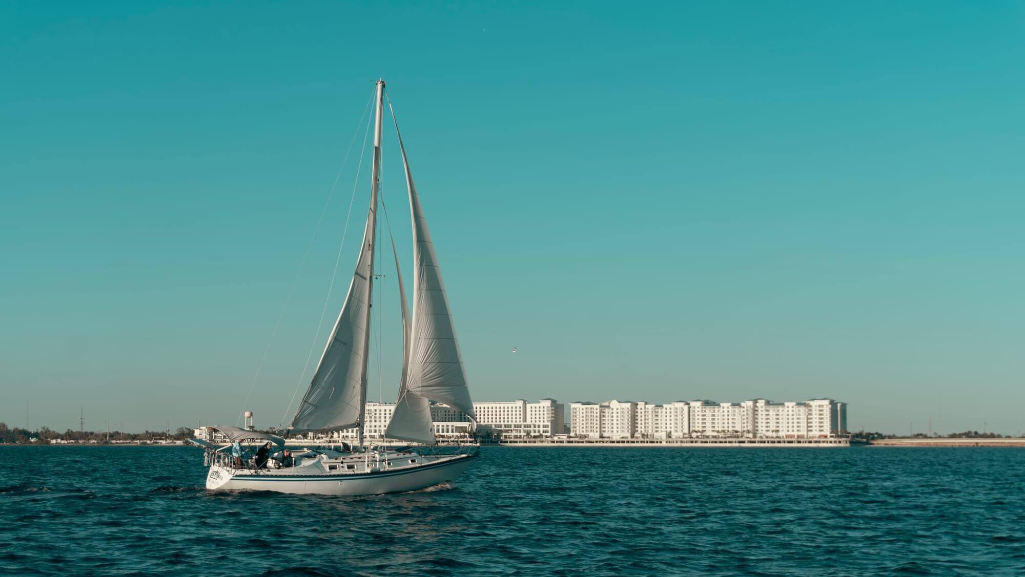sailboat with Sunseeker Resort backdrop