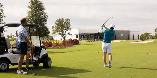 Golfer swing at Aileron Golf club