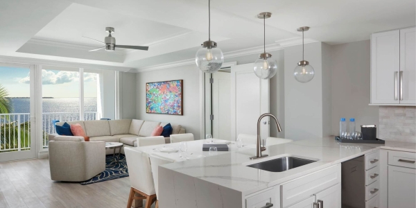 Sunsuites™ Two Bedroom Harbor View kitchen and living room at Sunseeker Resort