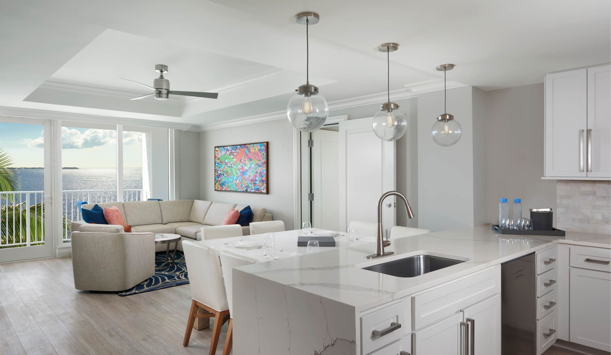 Sunsuites™ Two Bedroom Harbor View kitchen and living room at Sunseeker Resort