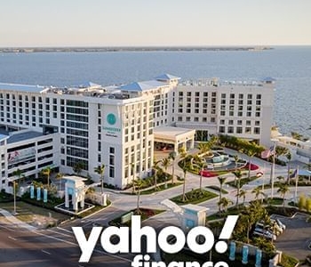 Yahoo! finance logo with image of Sunseeker resort