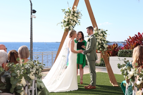 Bride and groom on Charlotte Harbor wedding lawn on the waterfront